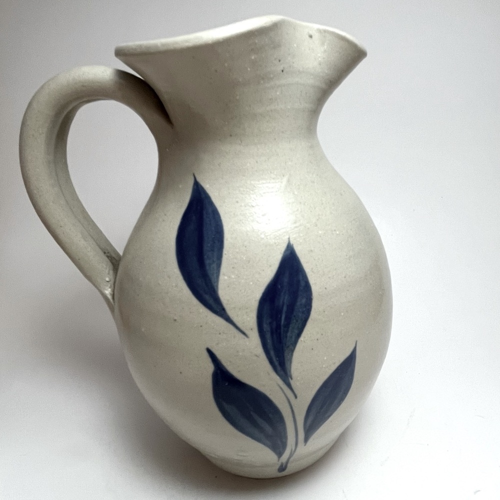 Vintage Williamsburg pitcher 8”. Salt glaze with cobalt blue design.